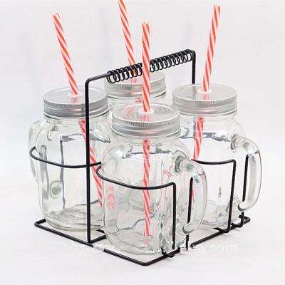 China Sustainable Set 4 Clear Glass Mason Jars With Handle Tin Lid PP Straw In Metal Holder for sale