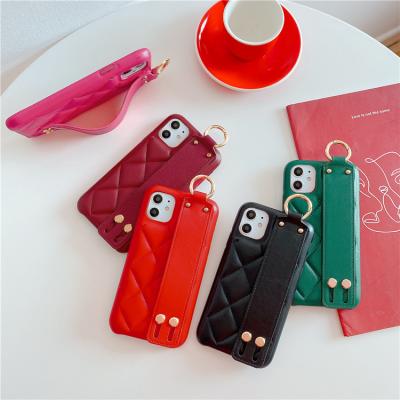 China Anti-fall For Apple 12pro Luxury Cell Phone Case Female For iPhone11 XS Leather Rhomboid Max 7 Wrist Band for sale