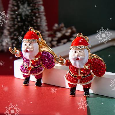 China Simple and handsome Christmas keychain fine Santa Claus Metal hot fine bag charm Decorative pendant small gift keychain for sale