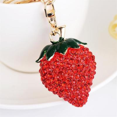 China Simple and handsome Fine keychain fruit strawberry Metal hot fine bag charm Key decorative charm small gift keychain for sale