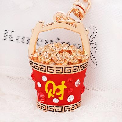 China Simple and handsome Fine keychain money barrel Metal hot fine bag charm Key decorative pendant small gift keychain for sale