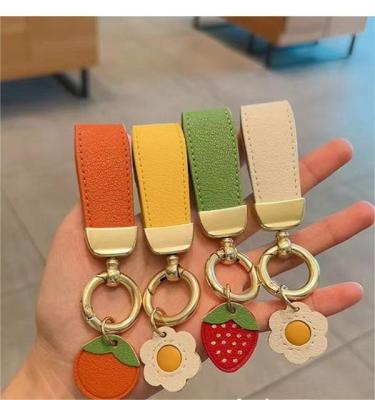 China Leather Pendant Waist Hanging Car Keychain Leather car key pendant PU strawberry pendant car keychain for sale