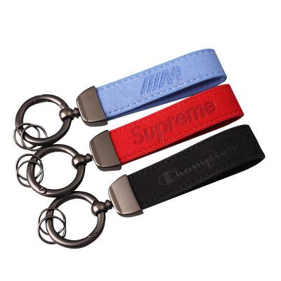 China Leather Sling waist car keychain leather car key pendant leather custom logo pendant car keychain for sale