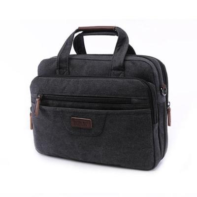 China Latest \Fasion Bridle Backpacks With Laptop Compartment Vintage Canvas Business Laptop Bag Briefcase Handbags For Men for sale