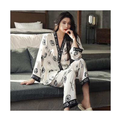 China New Fashion Sexy QUICK DRY V-Neck Pajamas Women's Camellia Women'S Long Sleeve Pants Ice Silk Pajamas for sale