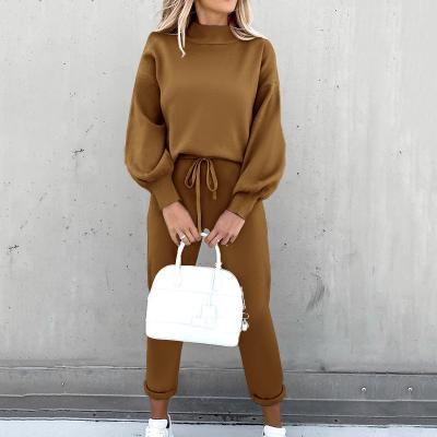 China Solid Color High Neck Sportswear New Anti-pilling Long Sleeve Pocket Pants Autumn And Winter Ladies Casual Two-piece Suit for sale