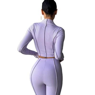 China Anti-pilling sports 2021 autumn new design wear reverse fashion fit female thin waist high sense breathable casual suit for sale