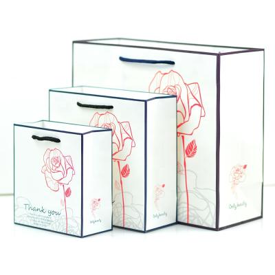 China Customized Reusable Luxury Recyclable Jewelry Packaging Bag Craft Paper Bag Packaging Gift Shopping Paper Bag for sale