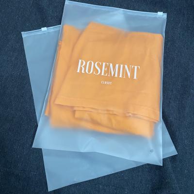 China Moisture Proof Recyclable Custom Frosted EVA Polyethylene T-shirt Packaging Plastic Bag Slider Zipper Self Seal Bag for sale