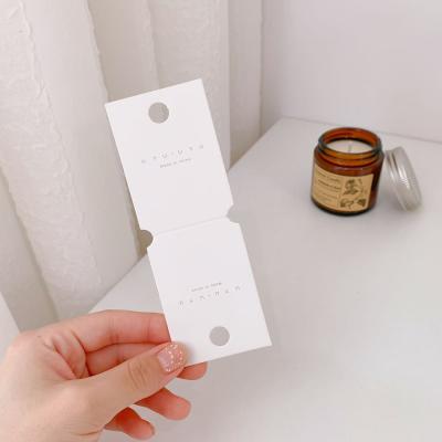 China Guangzhou Reused Other Garment Hang Tag For Dress Accessories, Printed Logo Clothing Paper Hangtags Tag Set Swing Tags for sale