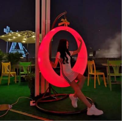 China Outdoor Furniture Rotating PE Battery Pack Refill Plastic Removeable Glow Led Patio Light Outdoor Swing With Stand for sale