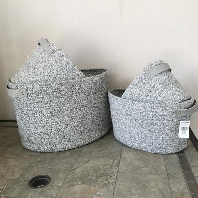 China Factory 202201 Durable High Quality Cotton Toy Storage Basket With PU Handle Rope Woven Set Of 4 Household Bases for sale