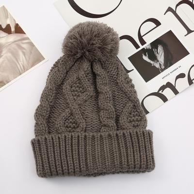 China Casual Classic Custom Fitted Pom Pom Hats Felted Hat Cable Fit Hats Wholesale Women 2023 for sale