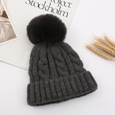 China Simple fashion hats 100% custom made winter knitted beanie hats acrylic knit with pom pom without inside for sale