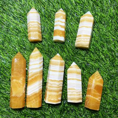 China China Crystal Point For Decoration Healing Natural Wholesale Crystal Stone Yellow Calcite Tower for sale