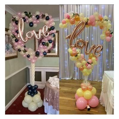 China Promotional Toy Wholesale Wedding Backdrop Balloon Wreath Arch Frame Heart Shaped Balloon Display Stand for sale