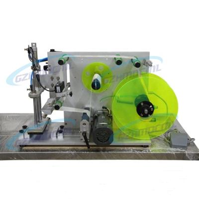 China Semi Automatic Square Lid Bottle CLOTHING Bottle Labeling Machine for sale