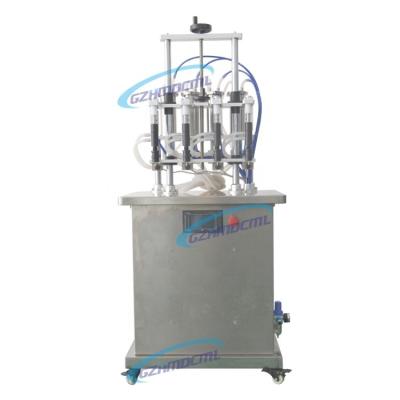 China Beverage Good Quality Four Heads Vacuum Liquid Perfume Filling Machine for sale