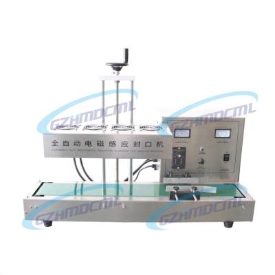 China Aluminum Foil Continuous Lid Automatic Food Heat Sealer Bottle Induction Heat Sealing Packaging Machinery for sale