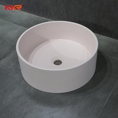 China Modern Round Countertop Sink Bowl Solid Surface Stone Basin For Hotels for sale