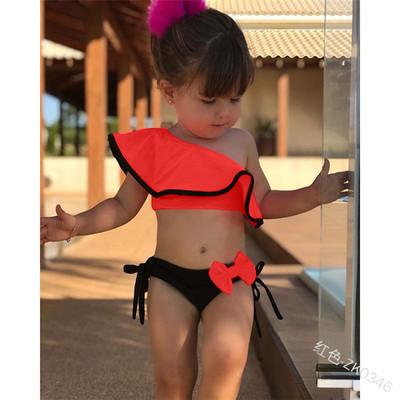 China 2020 New Lotus Leaf Children's African Female Swimsuit Candy Color Breathable Bow Oblique Split Cute Shoulder Swimwear Swimwear for sale