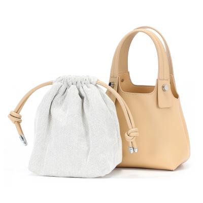 China Eco-friendly 100% Genuine Leather Composite Bag Women's Drawstring Handbag Bucket Bag Sets for sale