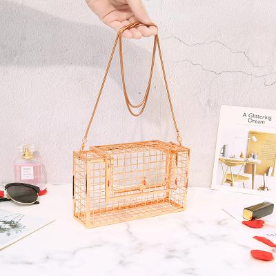 China 100% Eco-friendly Metal Cage Evening Clutch Wedding Party Wallet Tote Purse Hollow Purse Evening Clutches For Women for sale