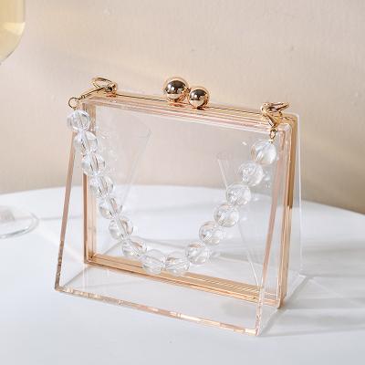 China 100% Eco-friendly Acrylic Transparent Trapezoid Clutch Box Bags With Pearl Handle Summer for sale