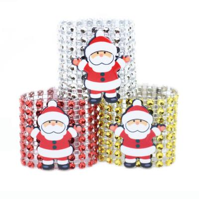 China Christmas Theme Viable Faux Stone Santa Mesh Napkin Ring For Christmas Party Dinner Table Decoration for sale