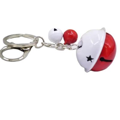 China Sweet Metal Candy Color Bell Key Blow Men And Women Lovers Key Chain Bag Kids Gifts for sale