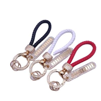 China Metal Manually Set Creative Leather Car Keys Blow Drill Car Key Chain Ring Rope Pendant Gift for sale