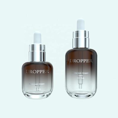 China 30ml 50ml 1oz Pet Oval Amber Plastic Dropper Bottle Essential Oil Serum Cosemtic Custom Cosmetic Packaging Dropper Bottle for sale