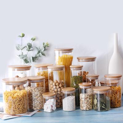 China Bulk Stored Food Spices Tea Coffee Mason Jars Canning Glass Sealed Glass Jars With Bamboo Lid for sale