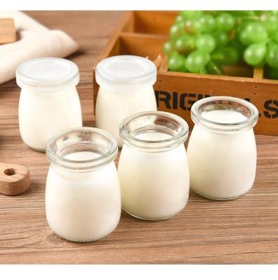 China 100ml/150ml Glass Food Yogurt Pudding Jar With Lid Jelly Milk Mousse Baking Mold Food Storage Container Bottle for sale