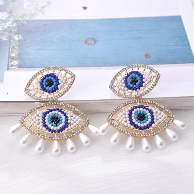 China CLASSIC Retro Hollow Eyes Diamond Pearl Earrings Female 2021 New Trend Jewelry for sale