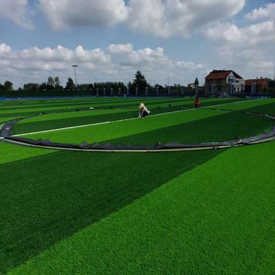 China 2021 newest high standard soccer field artificial grass mat for football stadium futsal grass for sale