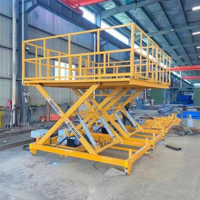 China 2000kgs workshop use scissor cargo lift for warehouse and workshop for sale