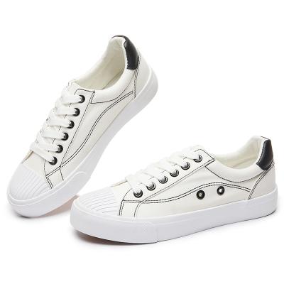 China Custom Made High Quality Classic Shoes Round Toe Canvas Shoes For Women Unique Canvas Sneakers White for sale