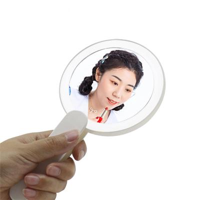 China Wholesale LED Lighted Mirror Lights Custom Various Color Round Mirror With Handle Hand Held Mirror For Pocket for sale