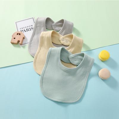 China Multi Washable Solid Color Cotton Baby Bibs Hidden Loop Baby Feeding Set for sale