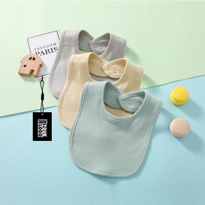 China Multi Washable Solid Color Cotton Baby Bibs Hidden Loop Baby Feeding Set for sale