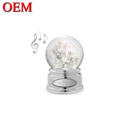 China 2020 Manufacturer Custom Resin Led Water Globe Snow Globe With Music Christmas Decoration OEM for sale