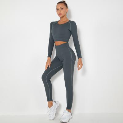 China Breathable Wholesale Striped Yoga Suit Seamless Knitted Long Sleeve Yoga Sets Running Sports Fitness Sets for sale