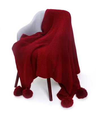 China Autumn And Winter Anti-static Red Ball Knitted Throw Blanket Soft Decorative Knitted Blankets for sale