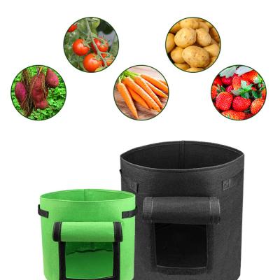 China Durable Bag Planter Pot With Fin And Handles Potato Bags For 25 Gallon Nonwoven Plant Grow for sale