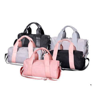 China Custom Gym Exercise OMASKA Large Capacity Gym Bags Bolsa de gimnasio Waterproof Travel Sport Ladies Duffel Bag for sale