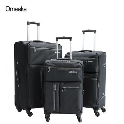 China Custom Spinner Wheel OMASKA Nylon 20 Luggage Bag Gepack 24 24 Inch 28 Inch Men Trolley Luggage Sets Equipaje for sale