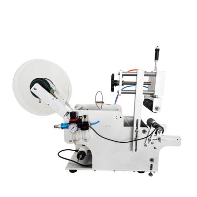 China YTK-80 semi-automatic rotary food labeling machine for round tin can/glass jar/plastic bottle/PET vial for sale