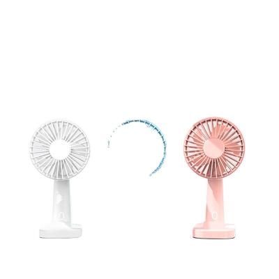 China Portable 2 in 1 mini fan with phone holder fan can ajustied through detaceable base built battery USB charging for sale