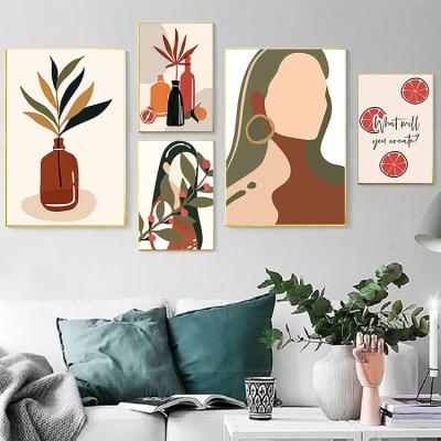 China Modern Abstract Girl Orange Leaf Flower Vintage Canvas Wall Art Nordic Posters And Prints Wall Pictures Painting For Home Decor for sale